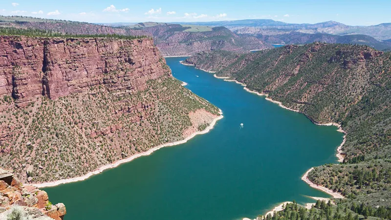 Angler floating the Green River near Dutch John, Utah